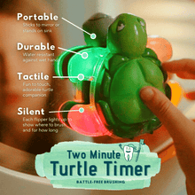 Load image into Gallery viewer, Infographic of benefits of Turtle Timer for toothbrushing. child presses green two minute turtle timer

